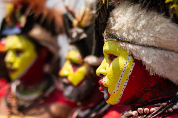 Port Moresby, 2013. Ambua, the Huli word for yellow clay, is sacred in their culture and combination with red ochre sets them apart from other tribes in the country.