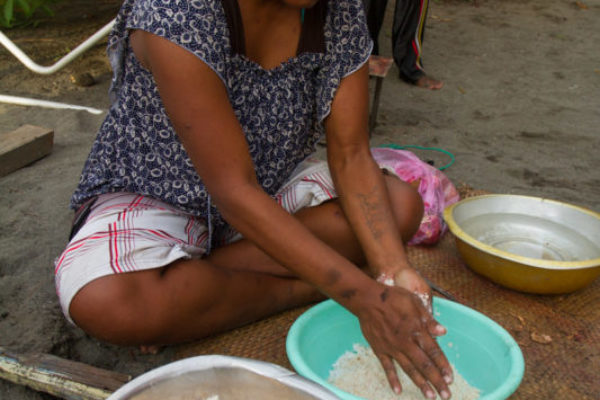 Fresh coconut flakes are added to dried sago - the makings of a delicious breakfast