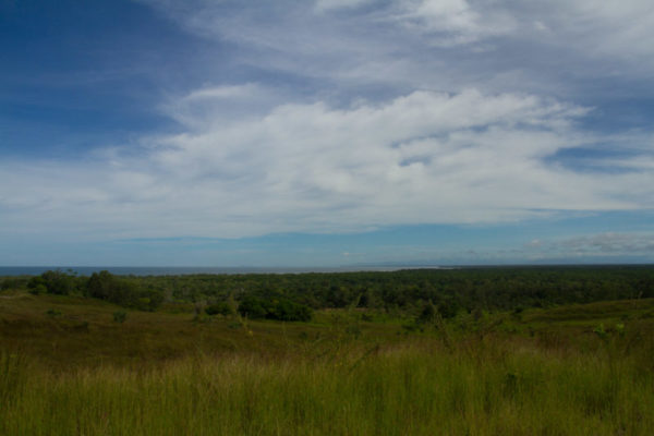 The shoreline of Iokea village can be seen from the top of the plateau.