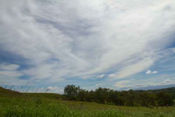 Wisps of cloud cover the great expanse of cloud.