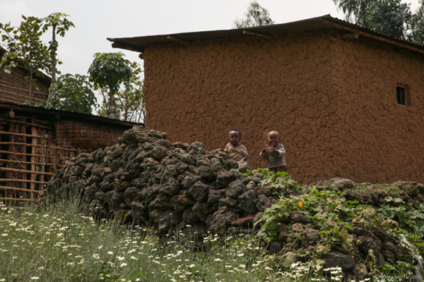 Children run to greet us as we make our way down the mountain