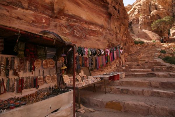 Simple stalls sell curious and cloth along the 800 steps leading to the Monastery.