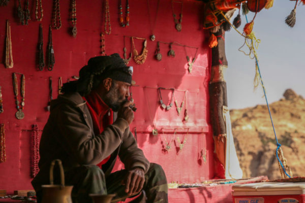 At the top of the ‘World’s Greatest View’ a local Jordian tradesman puffs on a cuban cigar.