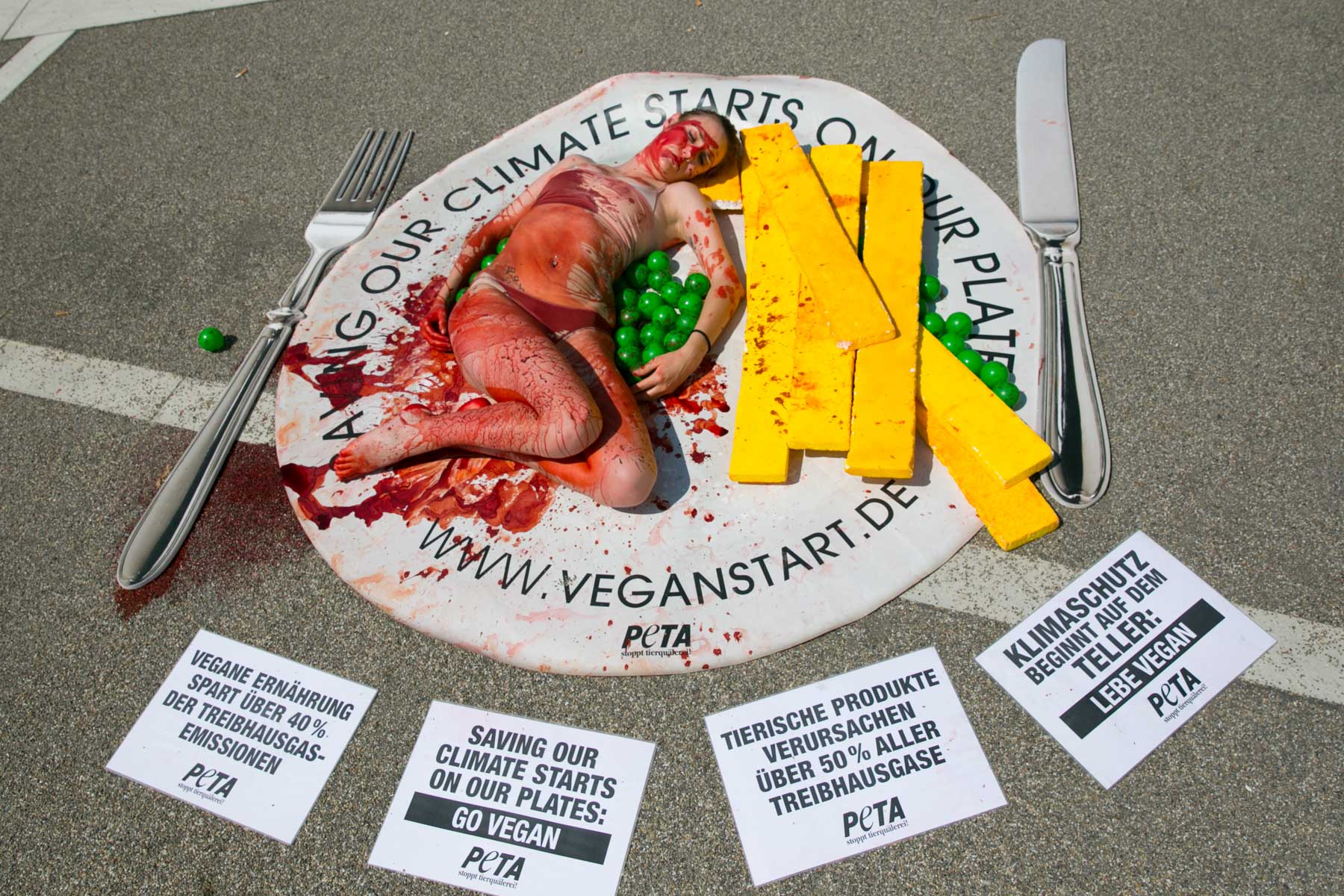 Bonn Climate Change Conference, 2015. Members of PETA hold a demonstration advocating for the protection of animals through a vegan diet.