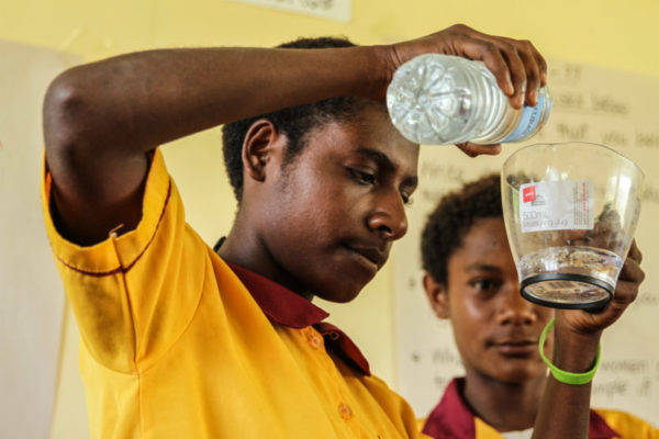 LeaLea, Central Province, 2014. Teachers from LeaLea Primary School review learning materials to strengthen their teaching.