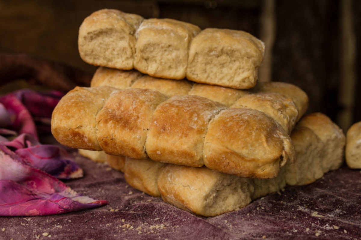 Mabuli, Hela Province, 2015. Freshly baked trays of bread cool on the counter at a local refreshment shop in Mabuli village.