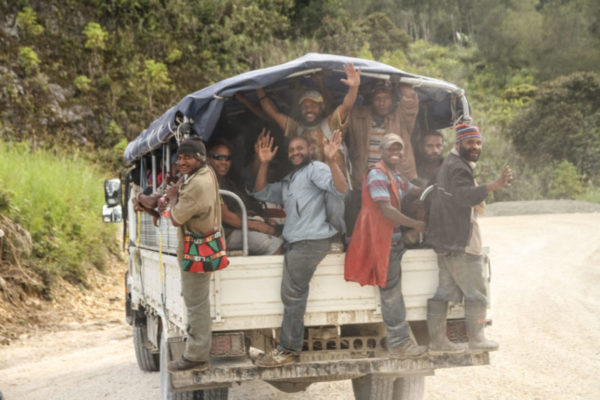 Mendi, Southern Highlands Province, 2012. One of the most common forms of travel along the Highlands Highway, the country’s largest land route, is catching a ride in the back of a truck headed for the main town of Mendi.